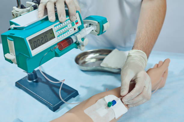 istock Using an infusion pump to administer medication to a patient 1174071789