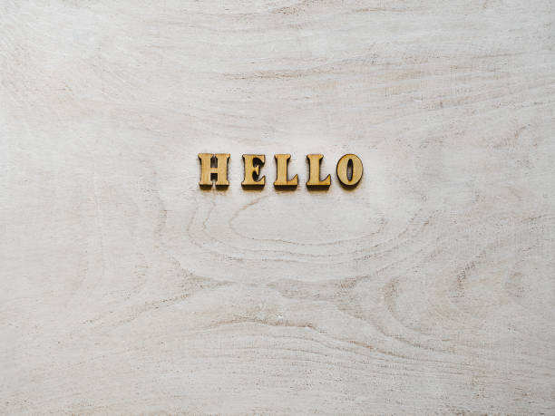 istock Wooden letters lying on a white board 1174073326