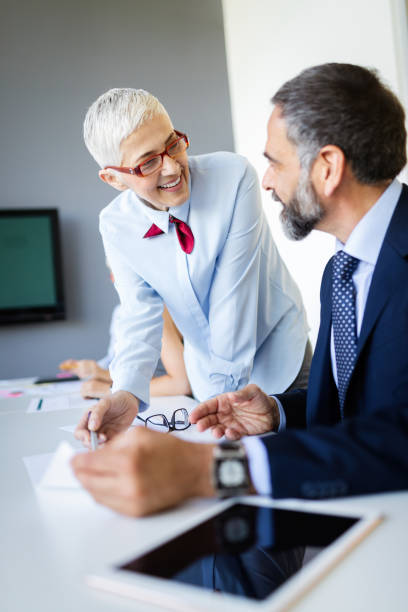istock Business people working discussing as a team at the office 1174073943