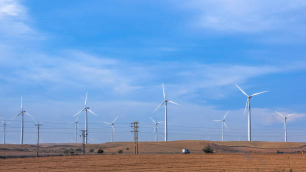 istock Wind Farm Turbines - Renewable Clean Green Energy 1174077482