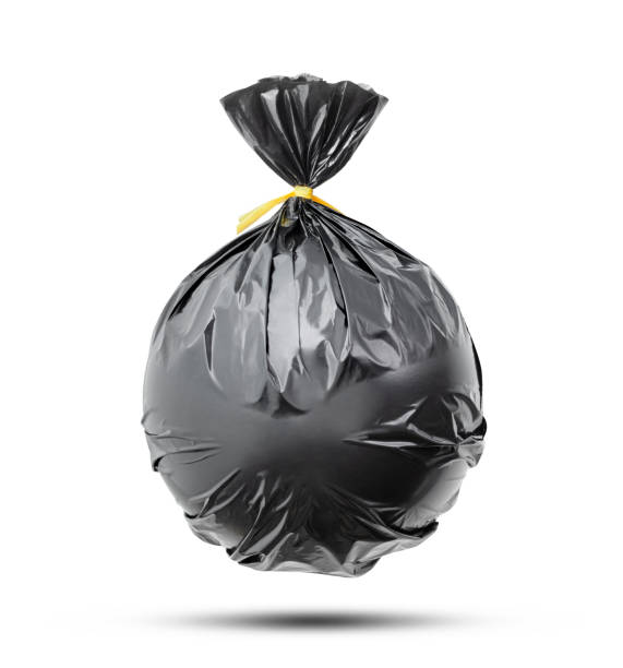 Garbage bag on white background Plastic black garbage bag on white background. garbage bag stock pictures, royalty-free photos & images