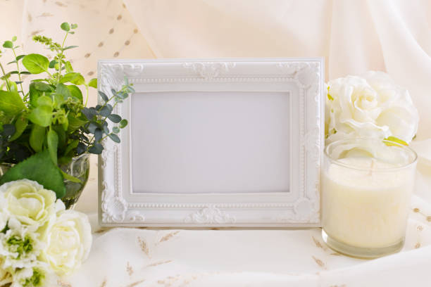 istock Picture frame and flowers 1174081852