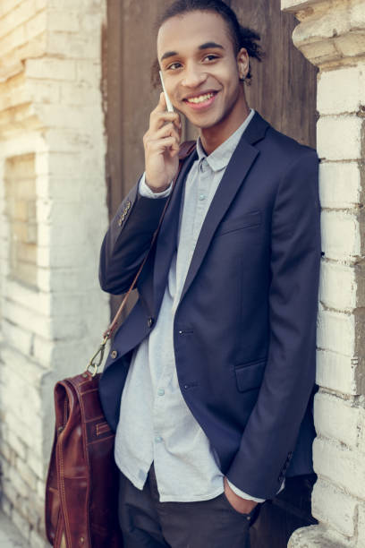 istock Young business man african descent outdoors style concept 1174089440