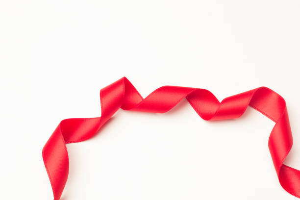 istock Red bow to decorate gifts 1174090144