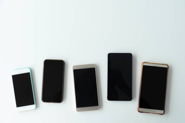istock Collection of mobile on table. Wireless connection devices. 1174094225