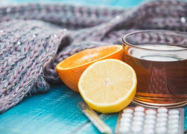 istock Cold and allergy treatment with tea and pills 1174096301