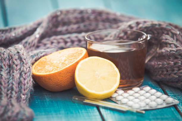 istock Cold and allergy treatment with tea and pills 1174096305