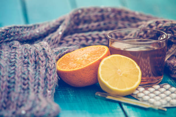 istock Cold and allergy treatment with tea and pills 1174096405