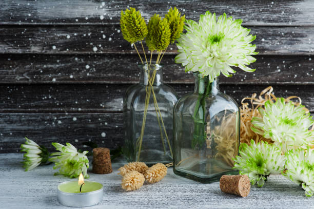istock Green chrysanthemum in bottles 1174101748