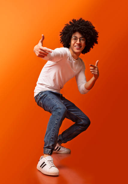 istock Emotional millennial guy pointing fingers at camera 1174105431