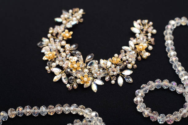istock Wedding accessory, tiara for hairstyle, crystal detail on a dark background 1174109995
