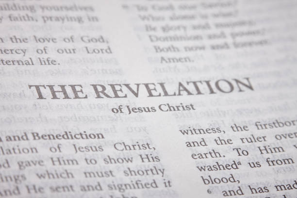 istock Bible open to the heading for The Revelation 1174112608