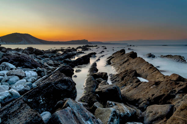 istock Mupe Bay, Jurassic Coast, Dorset, England 1174117000