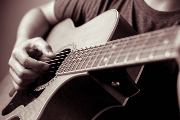 istock Musicians are playing acoustic guitar. 1174118799