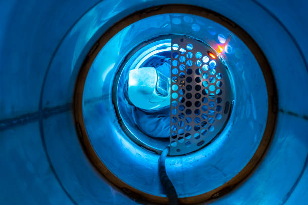 welder man welding a multitubular heat exchanger - confined space flash imagens e fotografias de stock