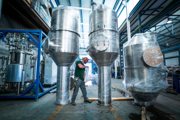 istock Industry worker wrapping in plastic finished inox 1174121488