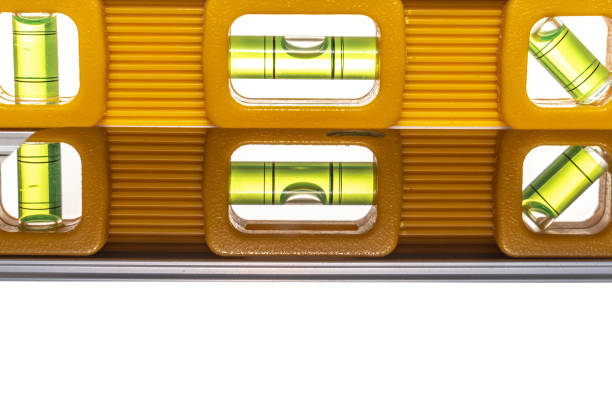 Yellow spirit level on white background