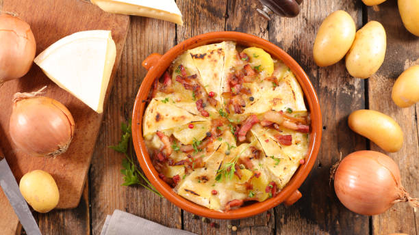 istock tartiflette, potato with cheese, bacon and cream 1174127546