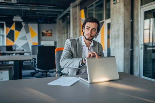 istock Businessman sitting in office 1174132019