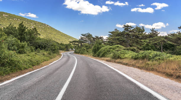 istock Mountain road for cars. 1174132486