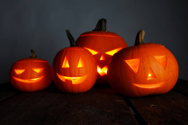 istock Halloween pumpkin and candles 1174134358