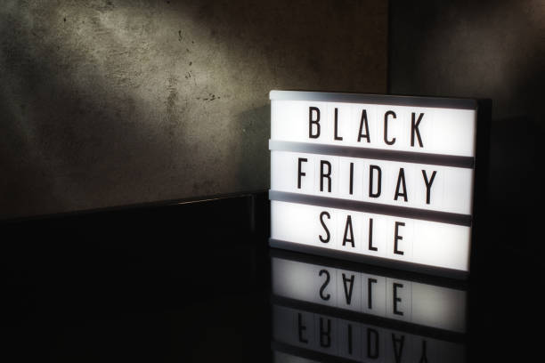istock Black Friday Sale message on a light box with a dark cinematic feel 1174134617