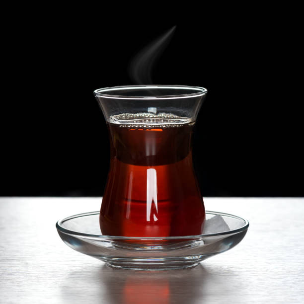 istock Black tea in glass on table 1174137023