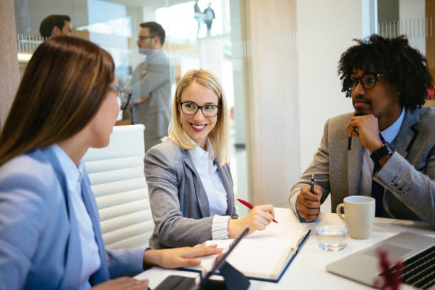 istock Team of young executives in a meeting 1174141731