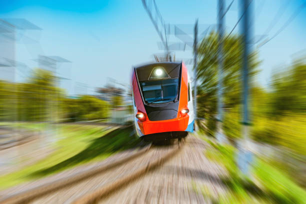 istock Modern high-speed train moves fast sunny day time. 1174143216