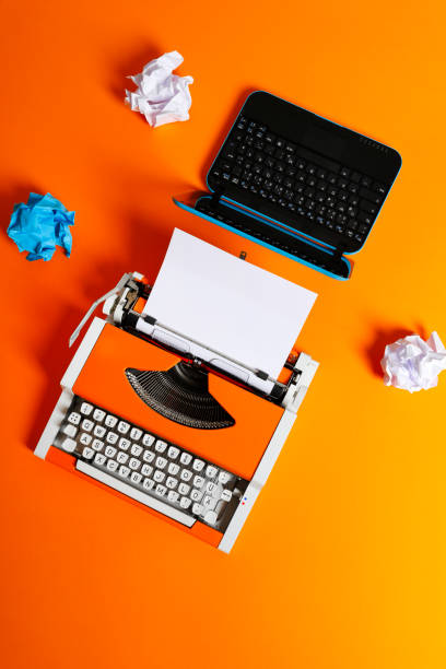istock Digital and analog – Laptop and 70s Typewriter 1174149041