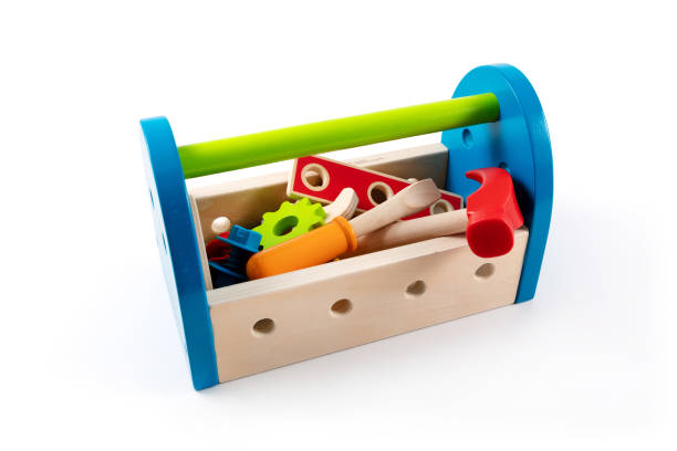 istock colorful wooden toolbox with toy tools isolated on white background 1174162681