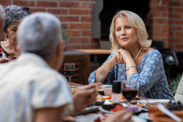 istock Senior Friends Having Vegan BBQ Party 1174163433