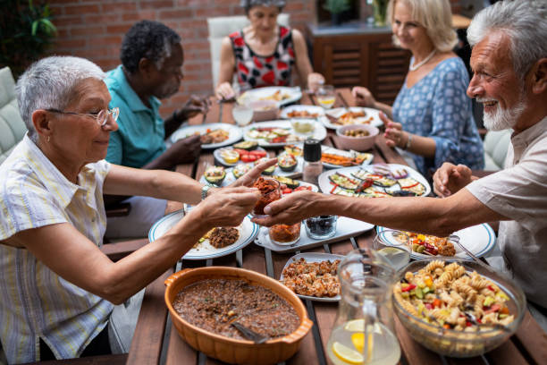 istock Happy Seniors Having Vegan BBQ Party 1174165093
