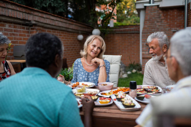 istock Happy Seniors Having Vegan BBQ Party 1174165135