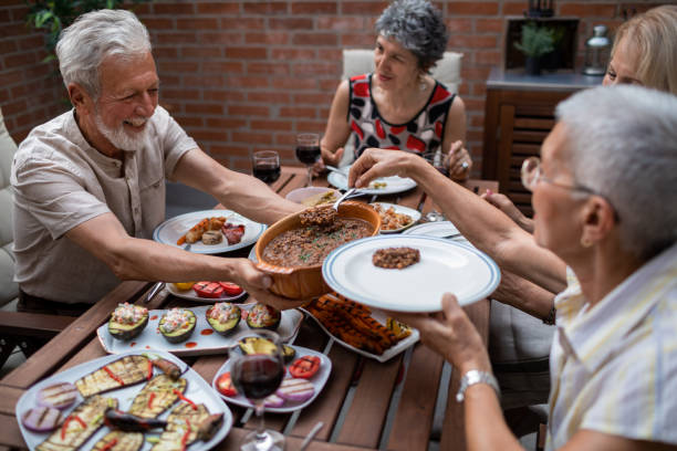 istock Seniors Having Vegan BBQ Party 1174165210