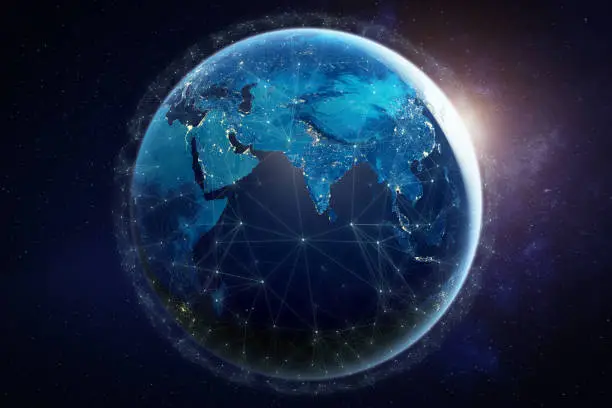 Photo of Internet network for fast data exchange around planet Earth from space, global telecommunication satellite grid over the world for IoT, mobile web, financial technology, 3d render, elements from NASA