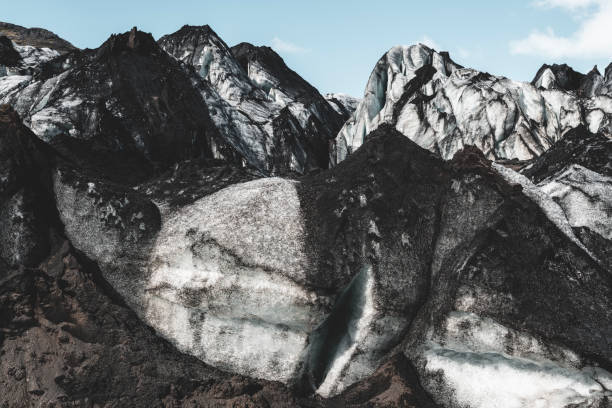 Solheimajokull Glacier. Dirty glacial ice from black sand and earth.