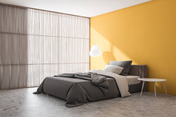 istock Yellow bedroom corner with blinds 1174191129