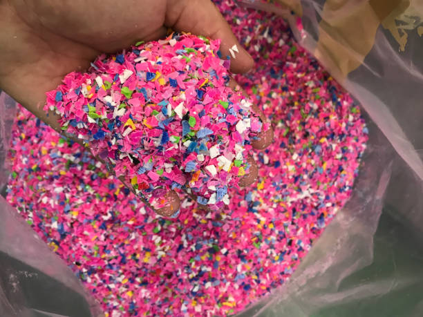 istock Crushed plastic granules for recycling.  Plastic crusher. Recycled plastic with mixed colors. The concept of recycled plastic used 1174193609
