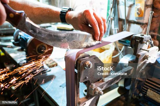 Sharpening Kukri Knife On Grinding Machine Stock Photo - Download Image Now  - Knife - Weapon, Utility Knife, Grinder - Industrial Equipment - iStock