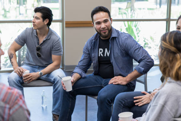 istock At break time in therapy, members chat together 1174210581