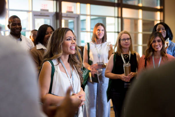 Cheerful business people attend conference