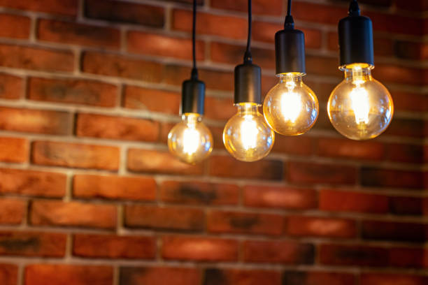 istock old brick wall and four old lamps close-up, background 1174212434
