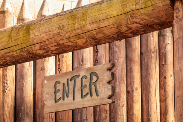 View of wooden gate with sign that reads \