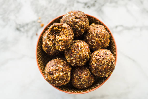 istock Energy balls with healthy ingredients on marble 1174238016