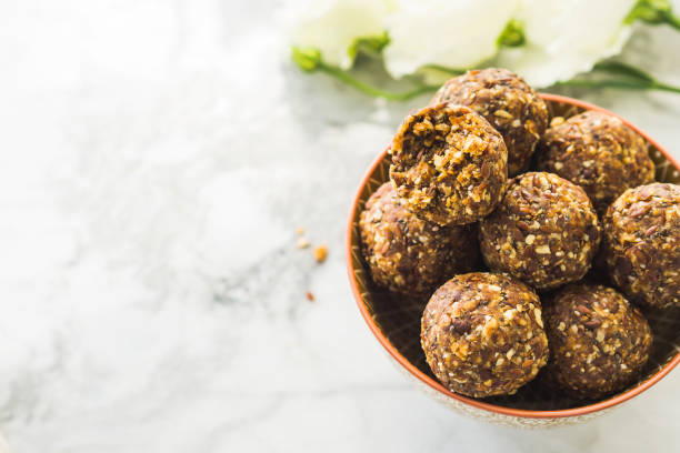 istock Energy balls with healthy ingredients on marble 1174238017