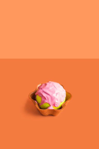 istock Tennis ball with pink paint in waffle cup 1174238301