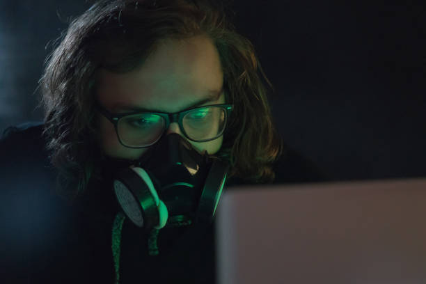 istock Young man wearing gas mask 1174238878