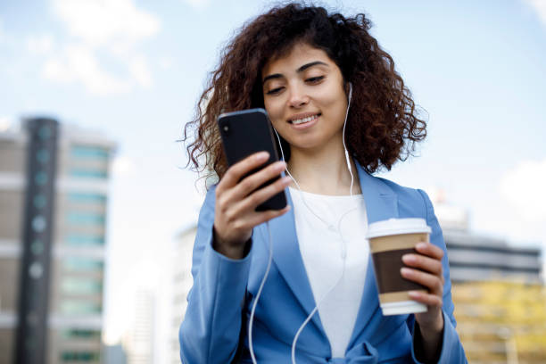 istock Young happy businesswoman communting to work 1174240115