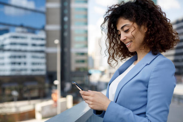 istock Young businesswoman using cellphone 1174240402